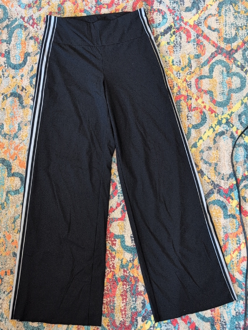 Athleta S Black wide leg pants with gray stripes on side